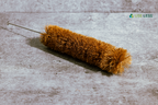 Eco-friendly coir bottle brush. Sustainable, plastic-free cleaning tool with coconut fiber bristles and wooden handle.