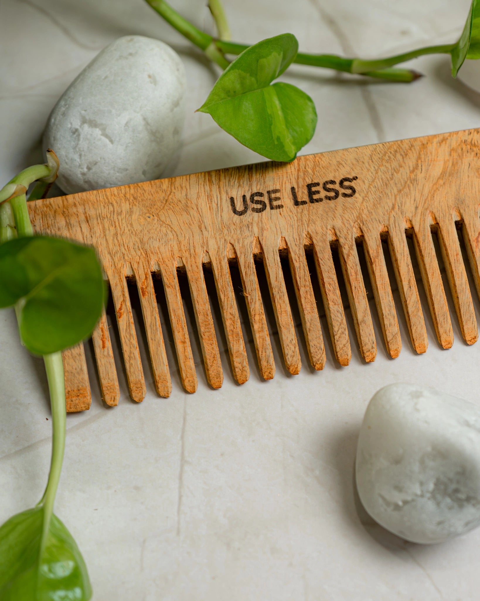 Eco-friendly bamboo shampoo comb. Sustainable, plastic-free hair detangling and grooming tool