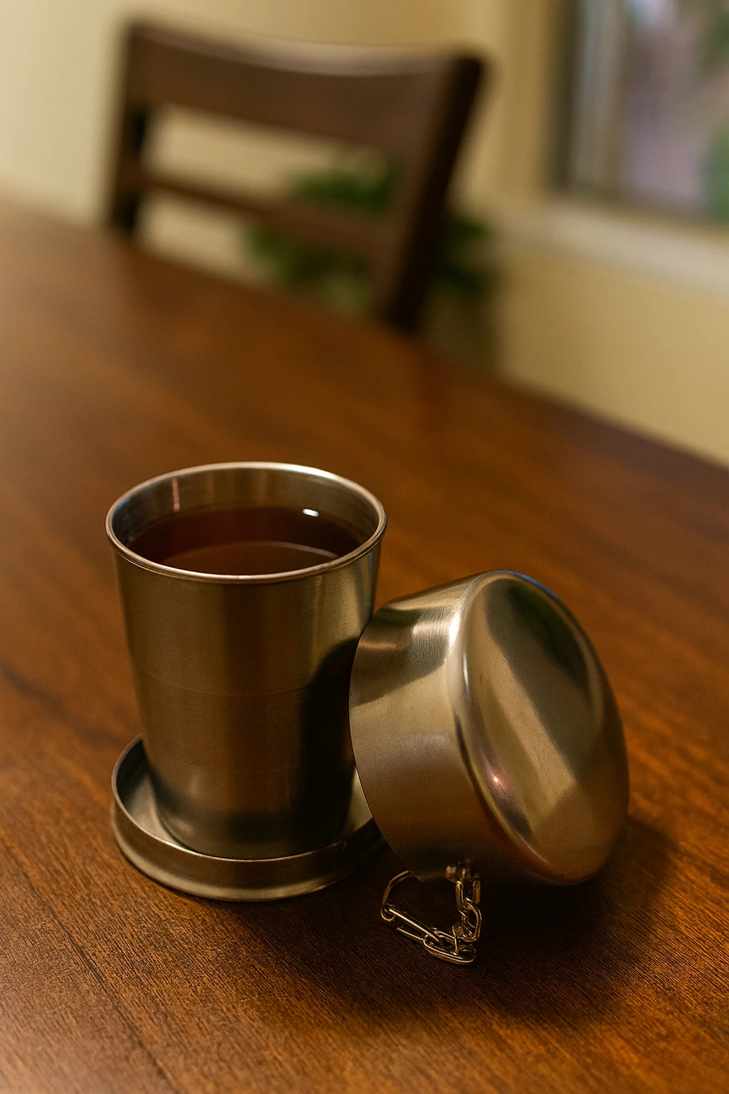 Eco-friendly stainless steel collapsible cup, portable and durable for sustainable, zero-waste drinking on the go.