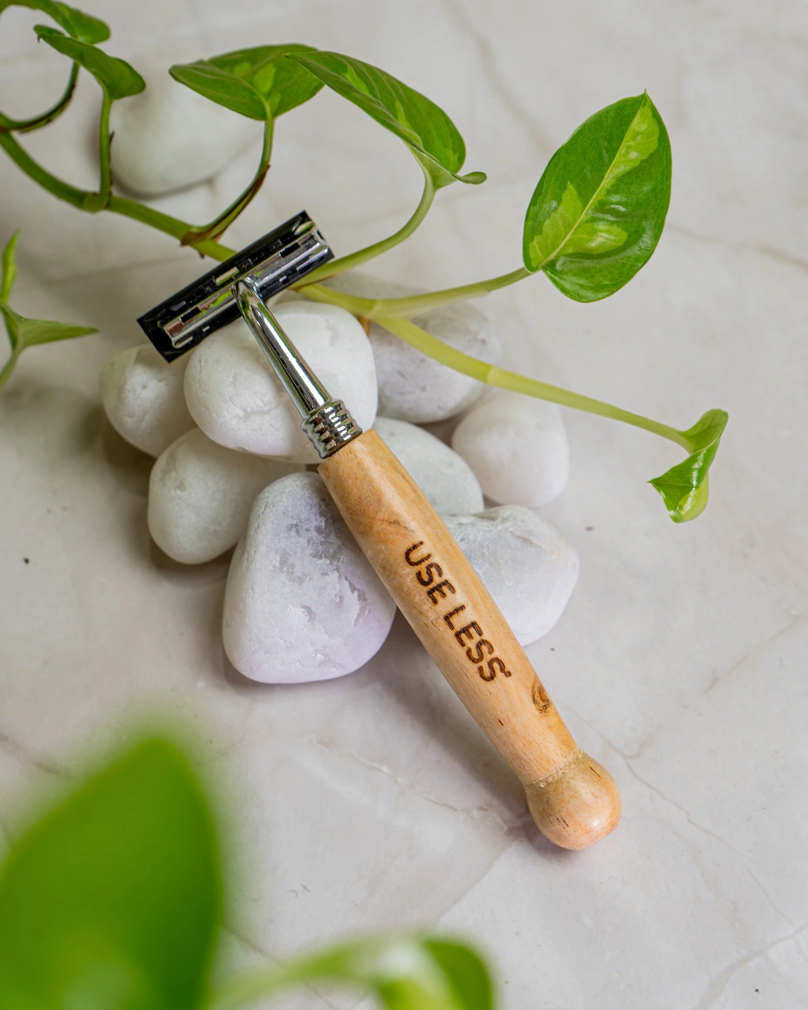 Sustainable wooden razor. Eco-friendly, reusable, plastic-free shaving tool for a zero-waste grooming routine.